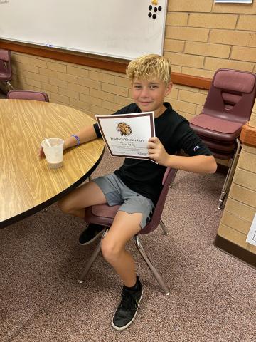 Student drinking root beer float
